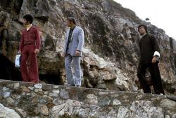 Jim Kelly, John Saxon, and Bruce Lee in Enter the Dragon.