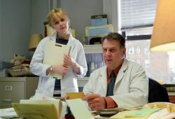 Kristen Dunst and Tom Wilkinson in Eternal Sunshine of the Spotless Mind.