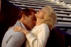 Dennis Quaid and Jessica Lange in Everybody's All-American. Dennis Quaid and Jessica Lange in Everybody's All-American.