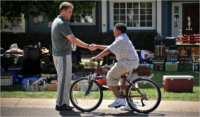 Will Ferrell and Christopher Jordan Wallace in Everything Must Go. Will Ferrell and Christopher Jordan Wallace in Everything Must Go.