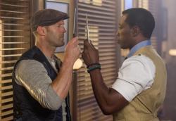 Jason Statham and Wesley Snipes compare knives in The Expendables 3. Jason Statham and Wesley Snipes compare knives in The Expendables 3.