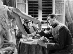 Adolphe Menjou and Gary Cooper in A Farewell to Arms. Adolphe Menjou and Gary Cooper in A Farewell to Arms.