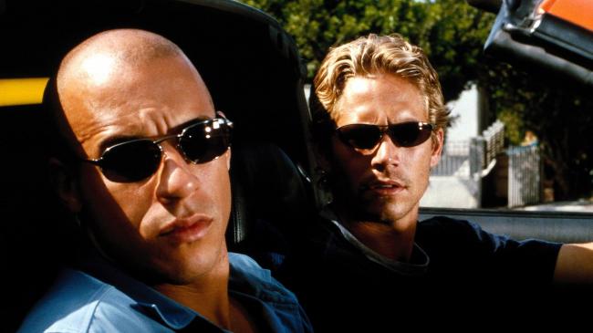 Vin Diesel and Paul Walker in The Fast and the Furious. Vin Diesel and Paul Walker in The Fast and the Furious.