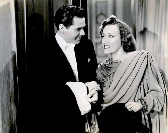 Desi Arnaz and Gloria Swanson in Father Takes a Wife. Desi Arnaz and Gloria Swanson in Father Takes a Wife.