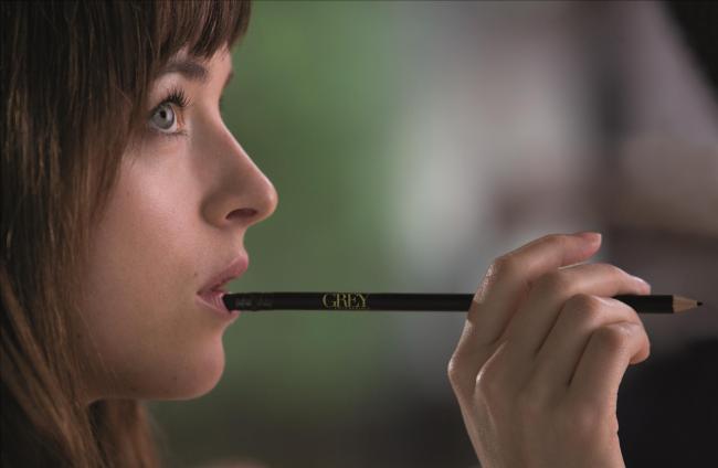 Dakota Johnson in Fifty Shades of Grey. Dakota Johnson in Fifty Shades of Grey.