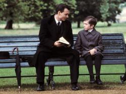 Johnny Depp and Freddie Highmore in Finding Neverland.