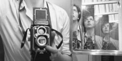 A photographic self portrait by Vivian Maier. A photographic self portrait by Vivian Maier.