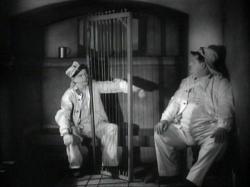 Stan Laurel and Oliver Hardy in The Flying Deuces. Stan Laurel and Oliver Hardy in The Flying Deuces.