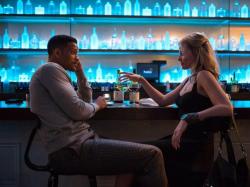 Will Smith and Margot Robbie in Focus. Will Smith and Margot Robbie in Focus.