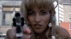 Pam Grier takes aim in Fort Apache, The Bronx.