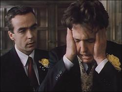 John Hannah and Hugh Grant in Four Weddings and a Funeral John Hannah and Hugh Grant in Four Weddings and a Funeral