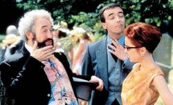 Simon Callow, John Hannah and Charlotte Coleman attend one of Four Weddings and a Funeral.