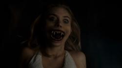 Imogen Poots with a scary CGI vampire mouth in Fright Night.