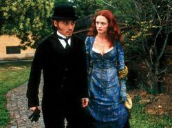 Johnny Depp and Heather Graham in From Hell. Johnny Depp and Heather Graham in From Hell.