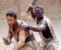 Russell Crowe and Djimon Hounsou in Gladiator.