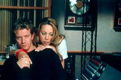 Max Beesley and Mariah Carey in Glitter. Max Beesley and Mariah Carey in Glitter.