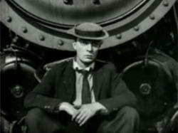 Buster Keaton rides the front of a locomotive in The Goat.