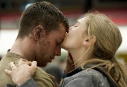 Aaron Taylor-Johnson and Elizabeth Olsen in Godzilla.