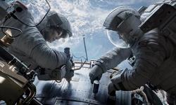 Sandra Bullock and George Clooney in Gravity. Sandra Bullock and George Clooney in Gravity.