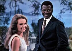 Katharine Houghton and Sidney Poitier in Guess Who's Coming to Dinner. Katharine Houghton and Sidney Poitier in Guess Who's Coming to Dinner.