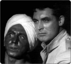Sam Jaffe and Cary Grant in Gunga Din. Sam Jaffe and Cary Grant in Gunga Din.