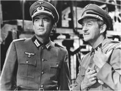 Gregory Peck and David Niven in The Guns of Navarone. Gregory Peck and David Niven in The Guns of Navarone.