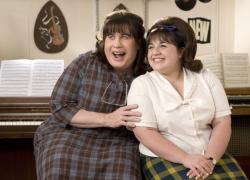 John Travolta and Nikki Blonsky in Hairspray. John Travolta and Nikki Blonsky in Hairspray.