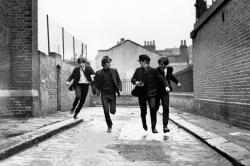 Paul McCartney, George Harrison, Ringo Starr and John Lennon do a lot of running about in A Hard Day's Night. Paul McCartney, George Harrison, Ringo Starr and John Lennon do a lot of running about in A Hard Day's Night.
