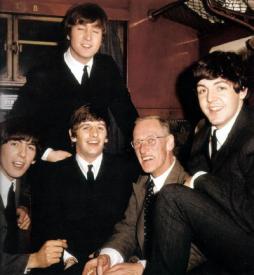 George Harrison, John Lennon, Ringo Starr, Wilfrid Brambell and Paul McCartney during the filming of A Hard Day's Night.