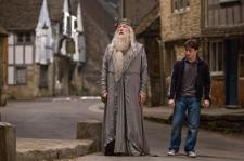 Professor Albus Dumbledore taking his favorite student, Harry Potter, on another deadly mission. 