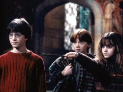 Daniel Radcliffe, Rupert Grint and Emma Watson in Harry Potter and the Sorcerer's Stone.