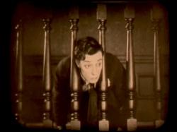 Buster Keaton gets his head stuck in The Haunted House. Buster Keaton gets his head stuck in The Haunted House.
