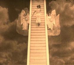 Buster climbs the steps to Heaven in The Haunted House.