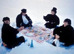 Ringo Starr, John Lennon, George Harrison and Paul McCartney get the munchies during the filming of Help! in the alps.