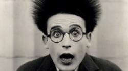 Harold Lloyd realizing he is high and dizzy.