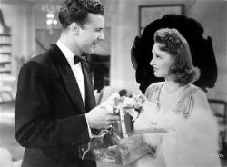 Dick Powell and Rosemary Lane in Hollywood Hotel.