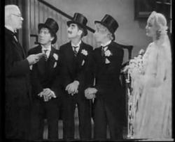 Chico, Groucho, Harpo and Thelma Todd in Horse Feathers. Chico, Groucho, Harpo and Thelma Todd in Horse Feathers.