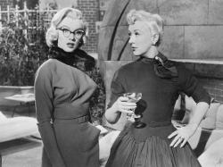 Marilyn Monroe and Betty Grable in How to Marry  a Millionaire.