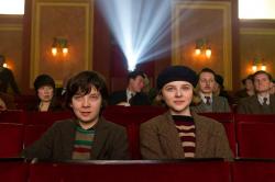 Asa Butterfield and Chloe Grace Moretz experience the magic of the movies in Hugo.