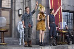 Josh Hutcherson, Elizabeth Banks, and Jennifer Lawrence in The Hunger Games: Catching Fire. Josh Hutcherson, Elizabeth Banks, and Jennifer Lawrence in The Hunger Games: Catching Fire.
