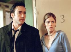 John Cusack and Amanda Peet in Indentity.