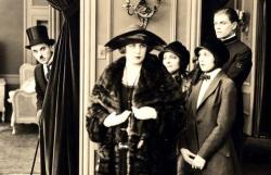 Charlie Chaplin, Edna Purviance and Lita Grey in The Idle Class.