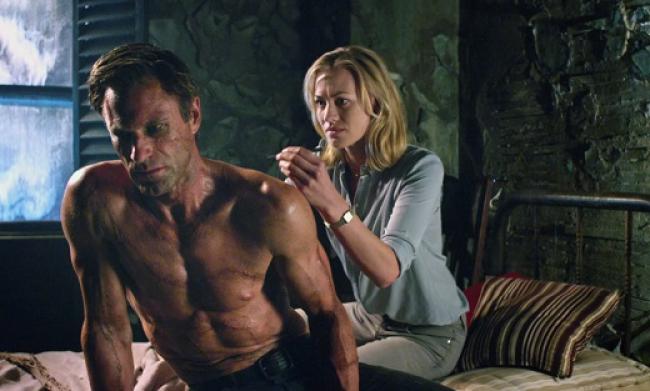 Aaron Eckhart and Yvonne Strahovski in I, Frankenstein. Aaron Eckhart and Yvonne Strahovski in I, Frankenstein.