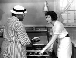 Louise Beavers and Claudette Colbert in Imitation of Life.
