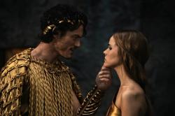 Luke Evans as Zeuss and Anne Day-Jones as Athena in Immortals.