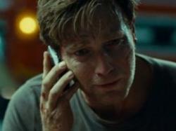 Ewan McGregor as Henry, making the hardest phone call of his life in The Impossible