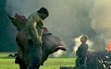 The Hulk towers over Tim Roth.