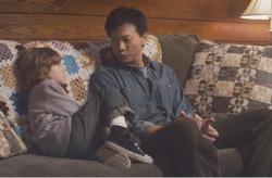Sebastian Banes and Patrick Wang in In the Family Sebastian Banes and Patrick Wang in In the Family