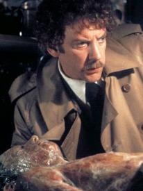 Donald Sutherland and a growing pod person in Invasion of the Body Snatchers