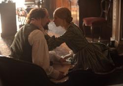 Ralph Fiennes and Felicity Jones in The Invisible Woman. Ralph Fiennes and Felicity Jones in The Invisible Woman.